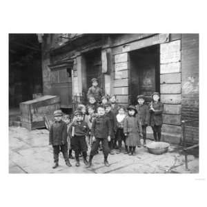 Children in Alley Attempting to Catch a Glimpse of a Moving Picture 