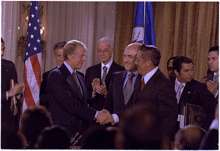 President Carter shakes hands with General Torrijos of Panama after 