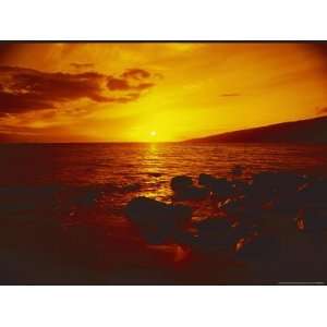  Sunset over the Ocean as Seen from a Maui Beach National 