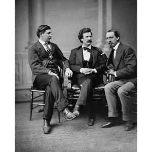  (aka Mark Twain) [center] George Alfred Townsend to his right, David 