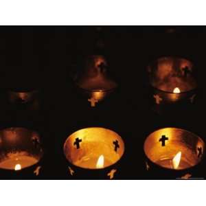  Votives Burn in a Darkened Church in Santa Fe Photographers 