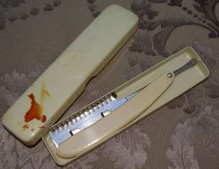 ANTIQUE PATENTED IVORINE RAZOR FAUX IVORY EARLY CELLULO  
