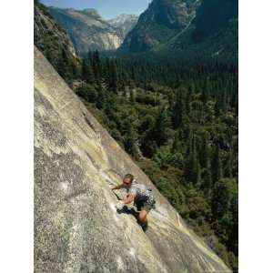 Rock Climber on Nutcracker, a Climb Rated 5.8 in Yosemite Valley 