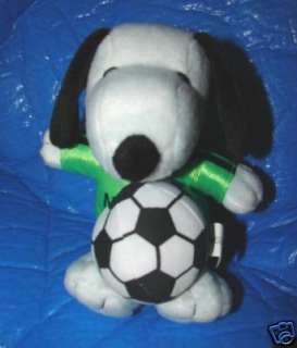 This is a Vintage MET LIFE PEANUTS SNOOPY WITH SOCCER BALL PLUSH TOY 