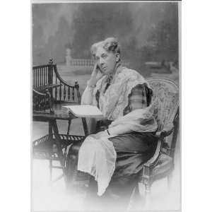  Madame DeWitt Schlumberger,seated at desk with book