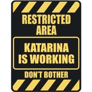   RESTRICTED AREA KATARINA IS WORKING  PARKING SIGN