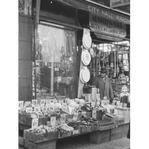  City Hall Hardware Store, with Wares on Sidewalk Stretched 