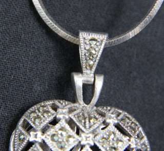 L94 ANTIQUE STERLING SILVER MARCASITE PUFFED SACHET HEART LOCKET AND 