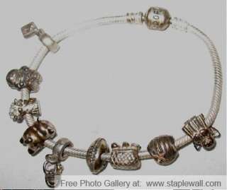 Genuine PANDORA STERLING BRACELET with 9 Beads  