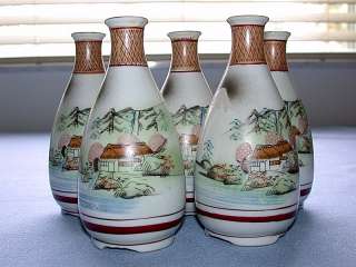 This auction is for a Beautiful Five Japanese Sake Decanters / Jugs 