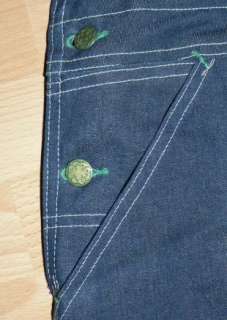   overalls in blue denim front has double pocket with pencil pocket