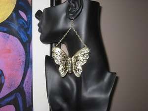 Basketball Wives look large chain butterfly earrings  