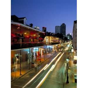  Bourbon Street and City Skyline at Night, New Orleans 