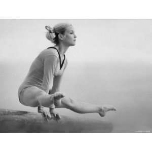  Gymnast Cathy Rigby, Training on Balancing Beam Stretched 