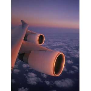  A Close View of the Wing and Jet Engines of a Plane in 